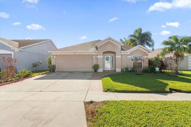 single story home with a garage and a front yard