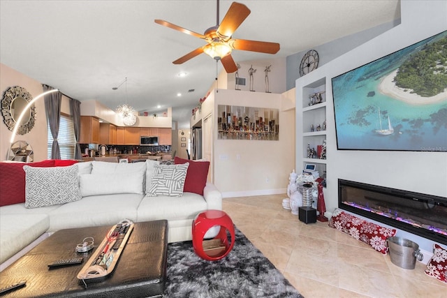 tiled living room with built in shelves, ceiling fan, lofted ceiling, and sink