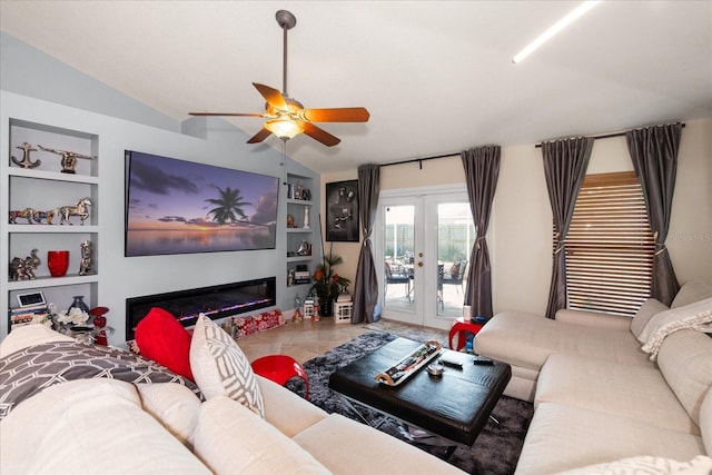 tiled living room with french doors, ceiling fan, lofted ceiling, and built in features