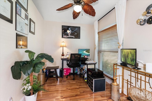 office space with ceiling fan and wood-type flooring