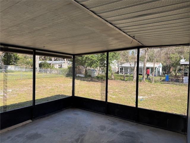 unfurnished sunroom with plenty of natural light