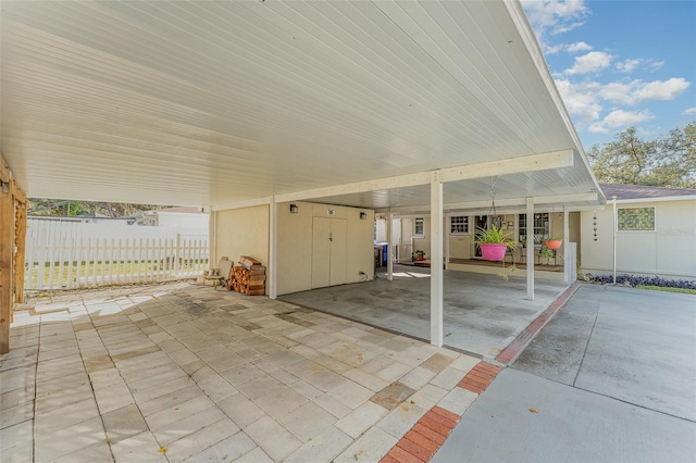 view of patio featuring a carport