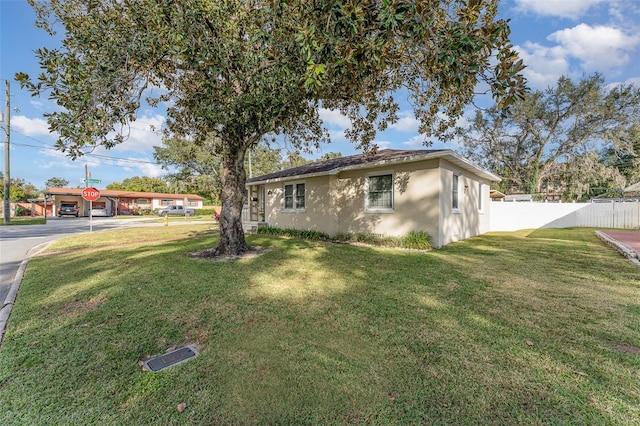 exterior space with a lawn