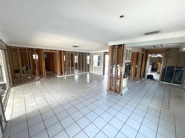 interior space featuring light tile patterned floors