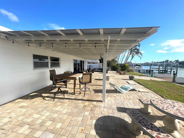 view of patio with a water view