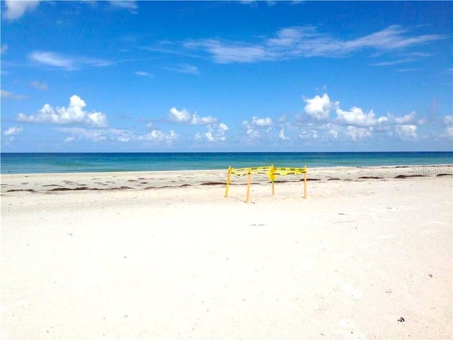 property view of water featuring a beach view