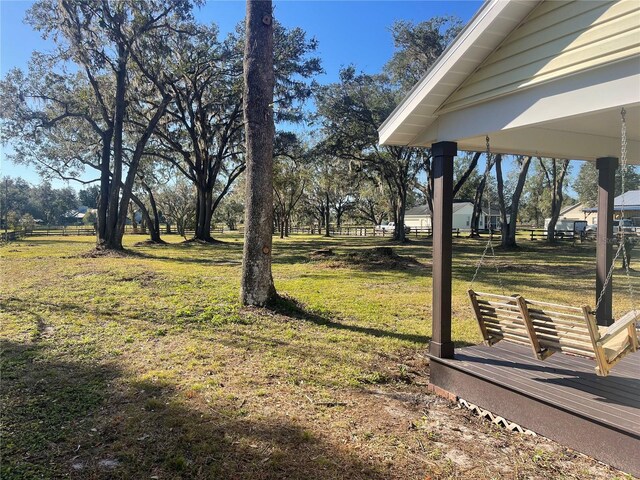 view of yard with a deck