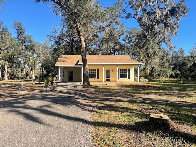 view of front of property with a carport