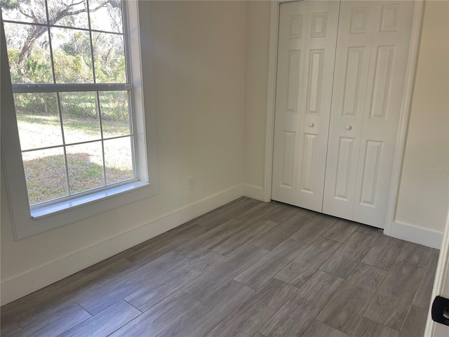 unfurnished bedroom featuring a closet