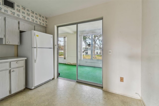 kitchen featuring white refrigerator