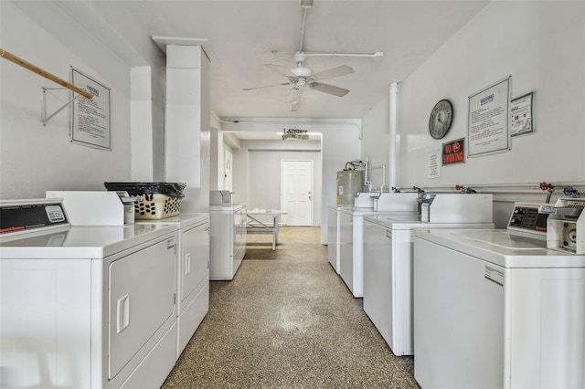 laundry room with ceiling fan, separate washer and dryer, and water heater