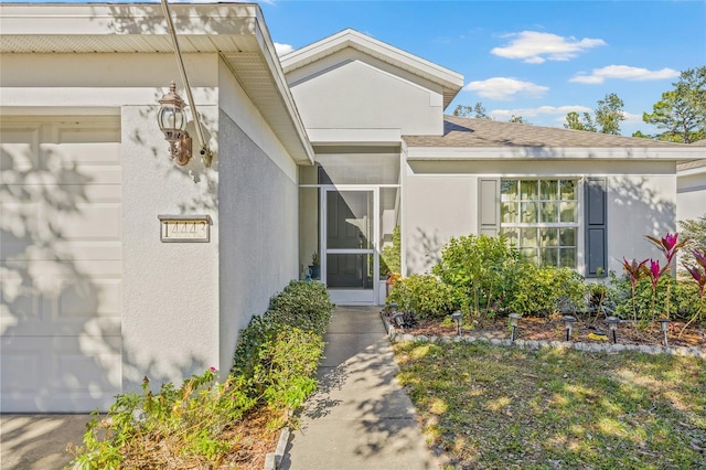 property entrance featuring a garage