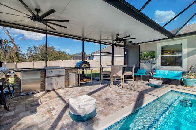 sunroom / solarium with ceiling fan