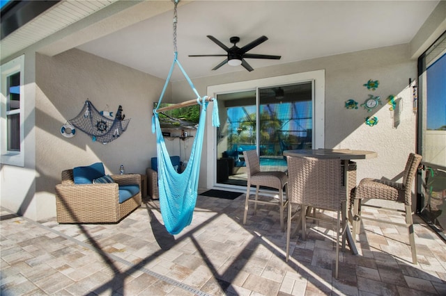 view of patio with ceiling fan