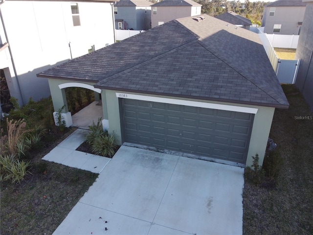 exterior space with a garage