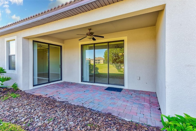 view of patio with ceiling fan