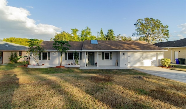 ranch-style home with a porch, a garage, and a front lawn