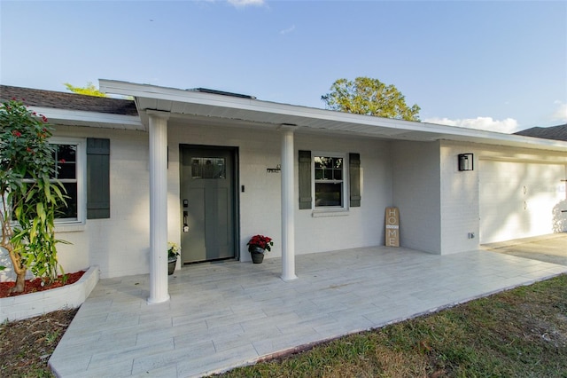 property entrance with a porch