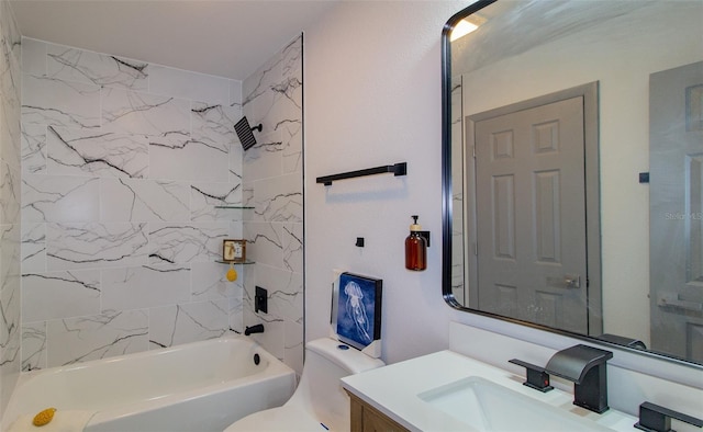 full bathroom featuring toilet, vanity, and tiled shower / bath