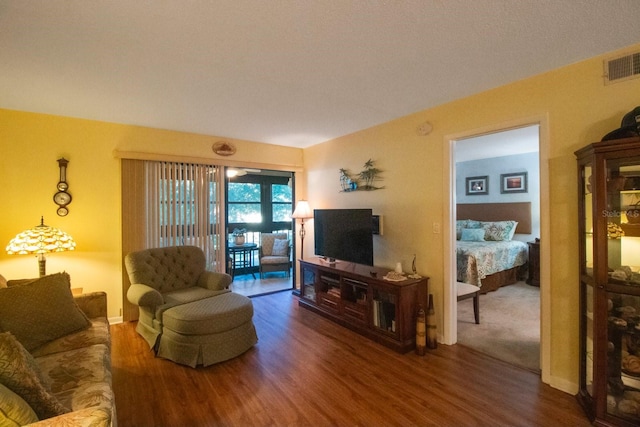 living room with dark wood-type flooring