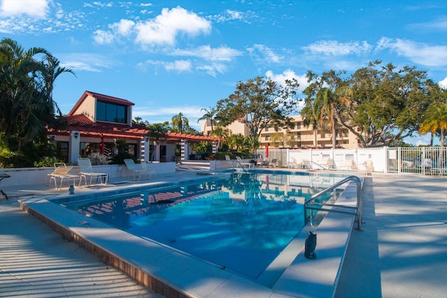 view of pool featuring a patio