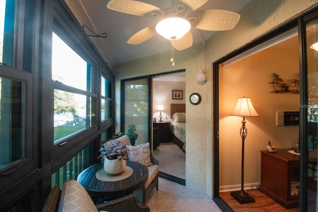 interior space featuring hardwood / wood-style floors and ceiling fan