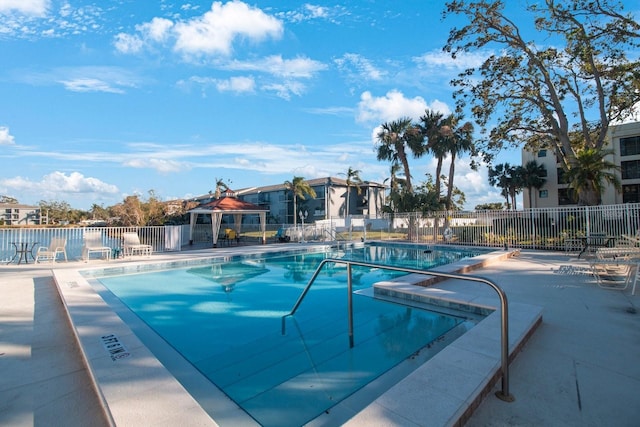 view of pool with a gazebo and a patio area