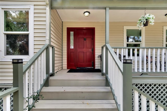 entrance to property with covered porch