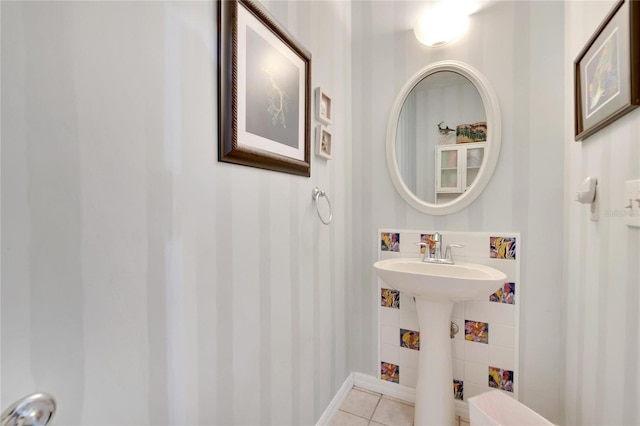 bathroom with tile patterned floors