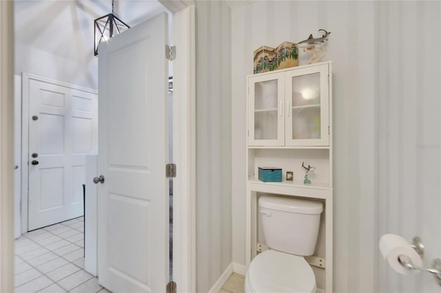 bathroom featuring tile patterned floors and toilet