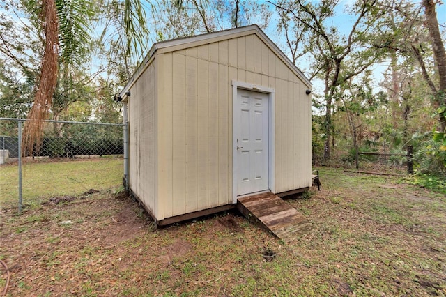 view of outdoor structure with a lawn