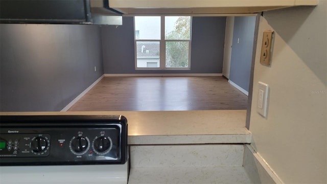 interior space with hardwood / wood-style floors