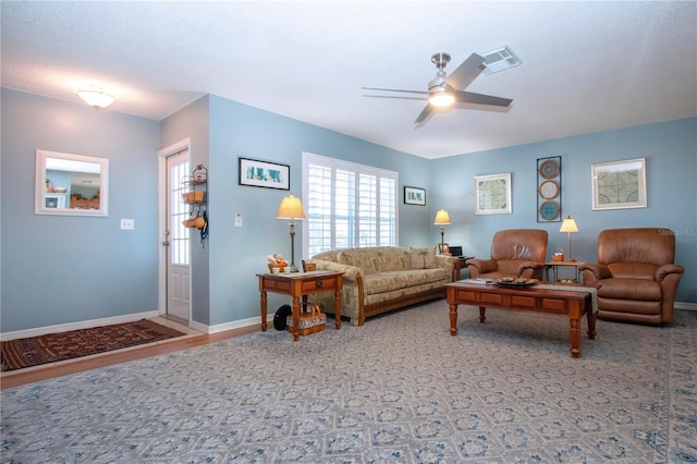 living room with ceiling fan