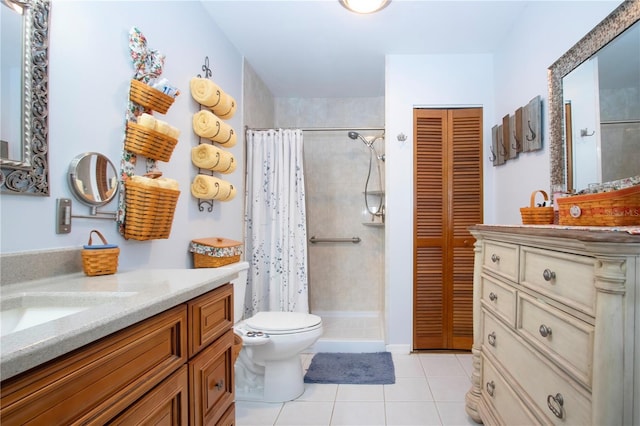 bathroom with tile patterned floors, vanity, curtained shower, and toilet