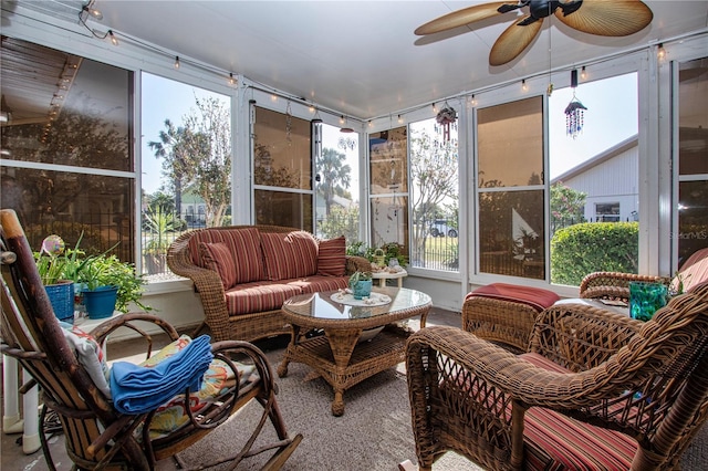 sunroom featuring plenty of natural light and ceiling fan