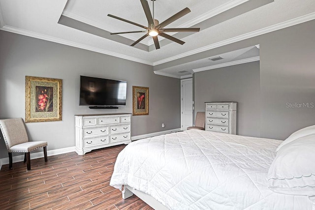 bedroom featuring ceiling fan, dark hardwood / wood-style floors, and ornamental molding