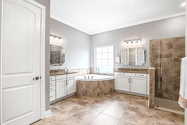 bathroom with tile patterned floors, vanity, separate shower and tub, and ornamental molding