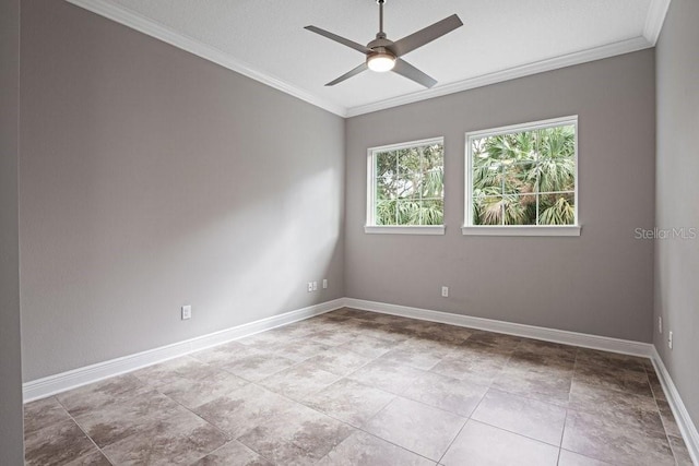 empty room with ceiling fan and crown molding