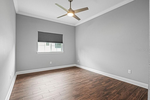 spare room featuring ceiling fan, wood-type flooring, and ornamental molding