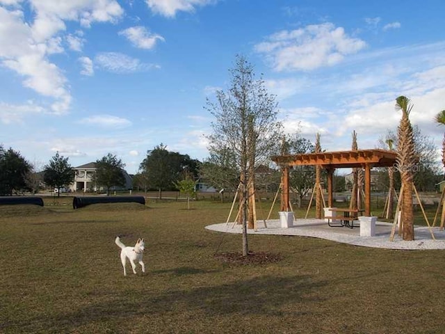 view of play area featuring a yard