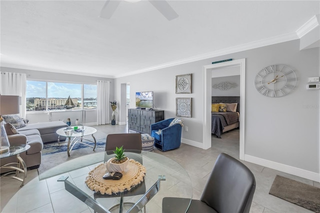 living room featuring ceiling fan, light tile patterned floors, and crown molding