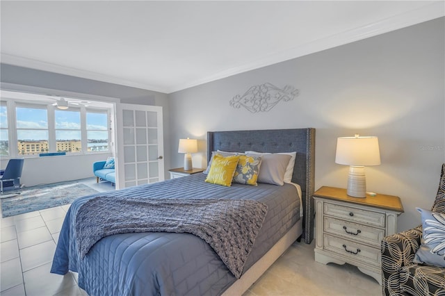 bedroom with light tile patterned floors and ornamental molding