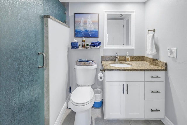 bathroom featuring tile patterned floors, vanity, an enclosed shower, and toilet