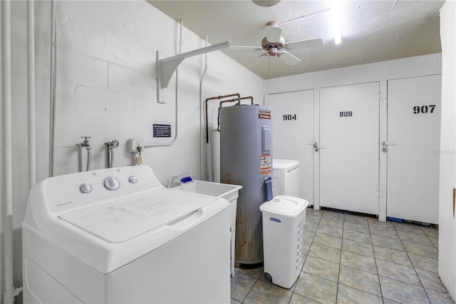 washroom featuring ceiling fan, light tile patterned floors, electric water heater, and washer / clothes dryer