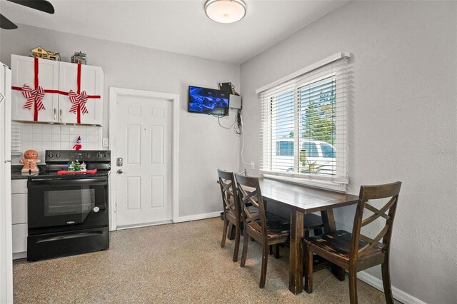 dining area with ceiling fan