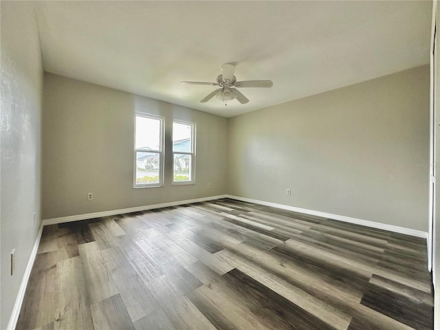 unfurnished room featuring ceiling fan and hardwood / wood-style flooring