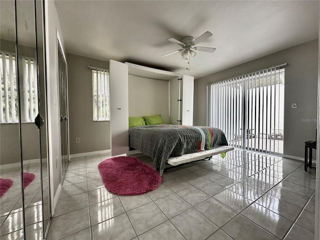 tiled bedroom with ceiling fan