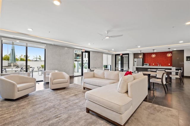 living room featuring ceiling fan