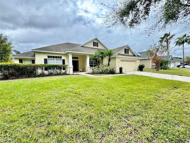 view of front facade featuring a garage and a front yard