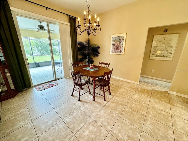 dining area with ceiling fan with notable chandelier and light tile patterned floors